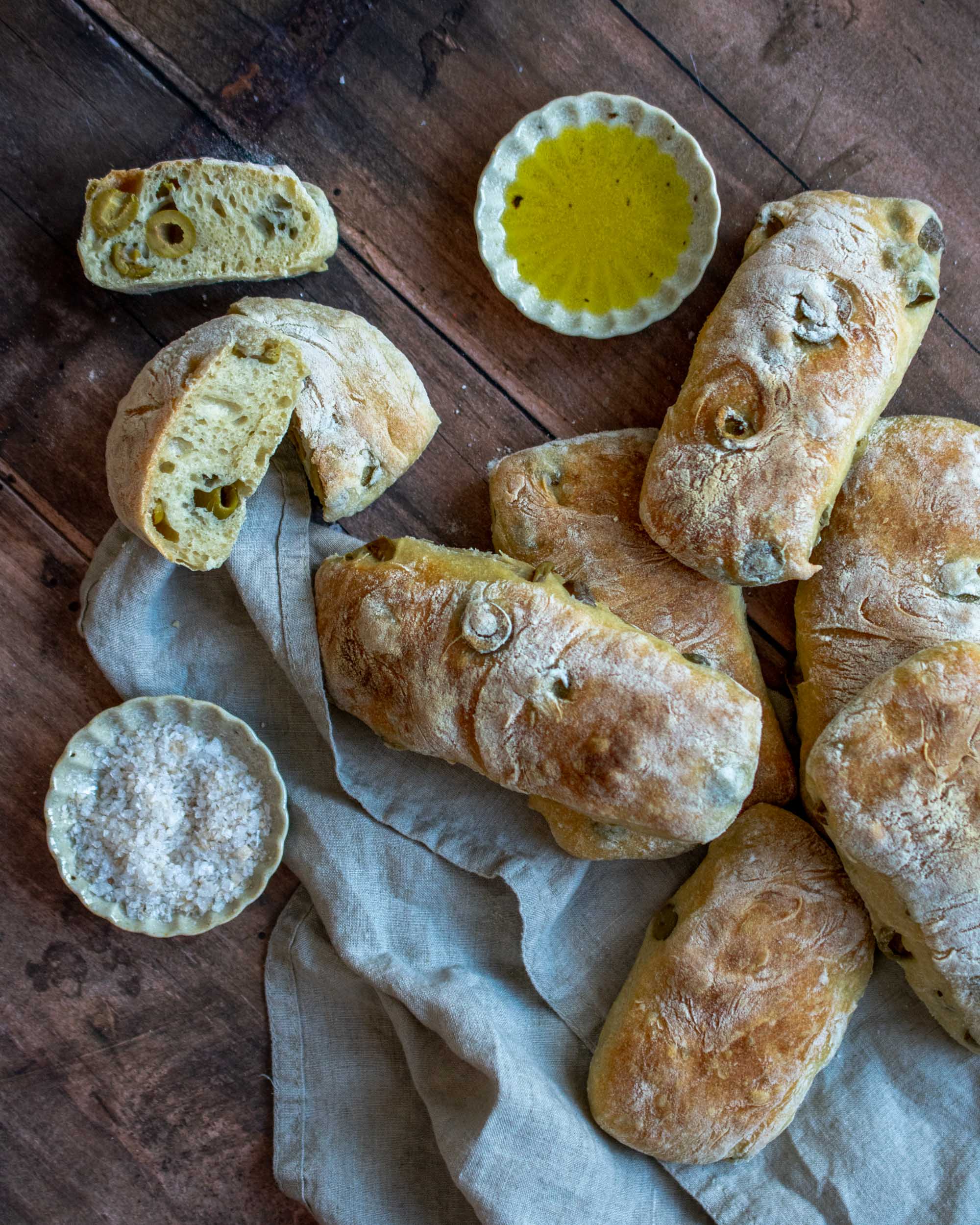 Rustic Olive Bread Buns Apron & Whisk