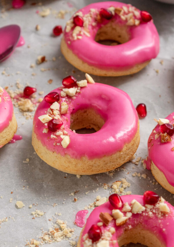 Almond baked doughnuts with a pomegranate glaze
