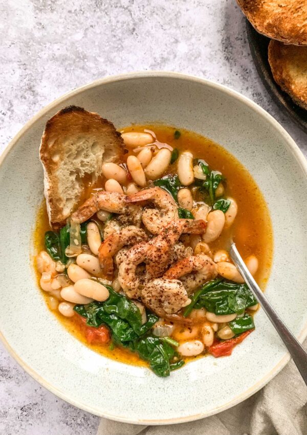 Harissa Cannellini Beans Soup with Sumac Shrimp