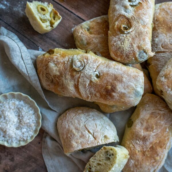 Rustic Olive Bread Buns Apron & Whisk