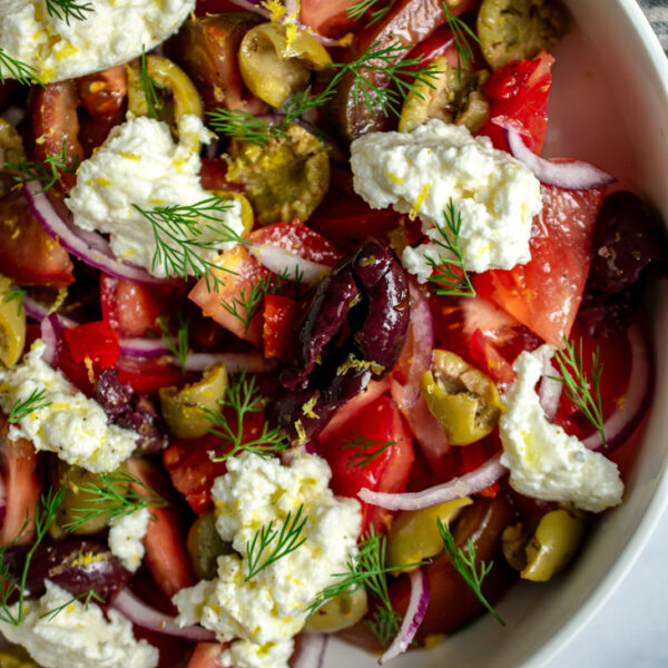Tomato Salad with Smashed Marinated Olives and Ricotta Cheese