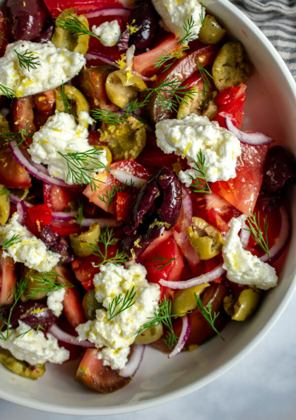 Tomato Salad with Smashed Marinated Olives and Ricotta Cheese